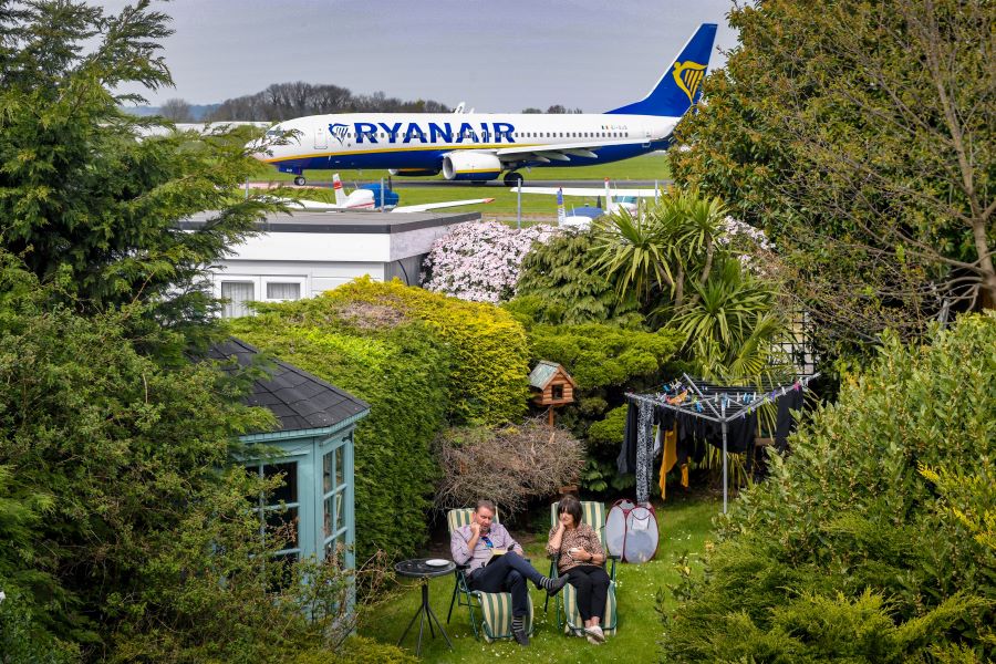 Pensioner who lives next to airport has 50 planes a day driving past her back garden