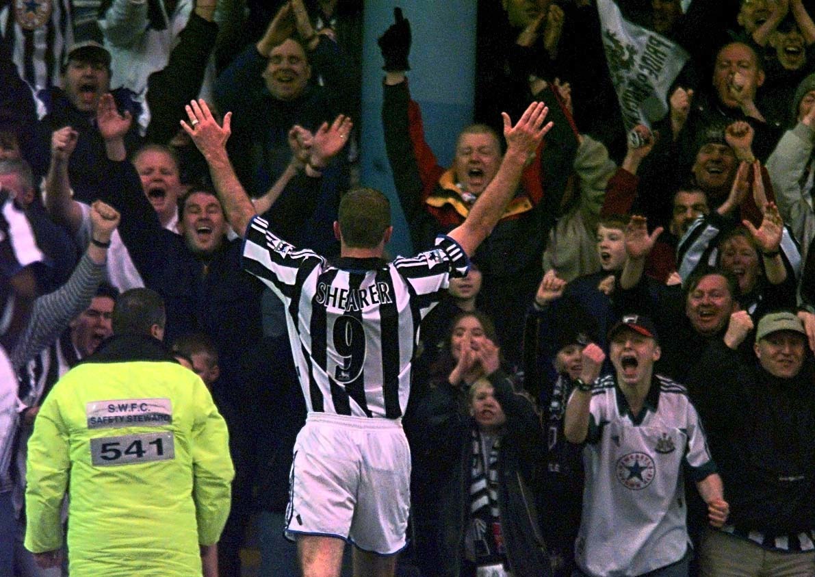 This picture can only be used within the context of an editorial feature. Newcastle United captain Alan Shearer celebrates with the fans after scoring Newcastle's second goal against Sheffield Wednesday during their FA Premiership match at Hillsborough.   * Final Score: Sheffield Wednesday 0  Newcastle United 2.