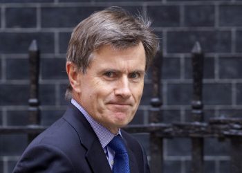 Chief of the Secret Intelligence Service Sir John Sawers arrives at 10 Downing Street, central London.