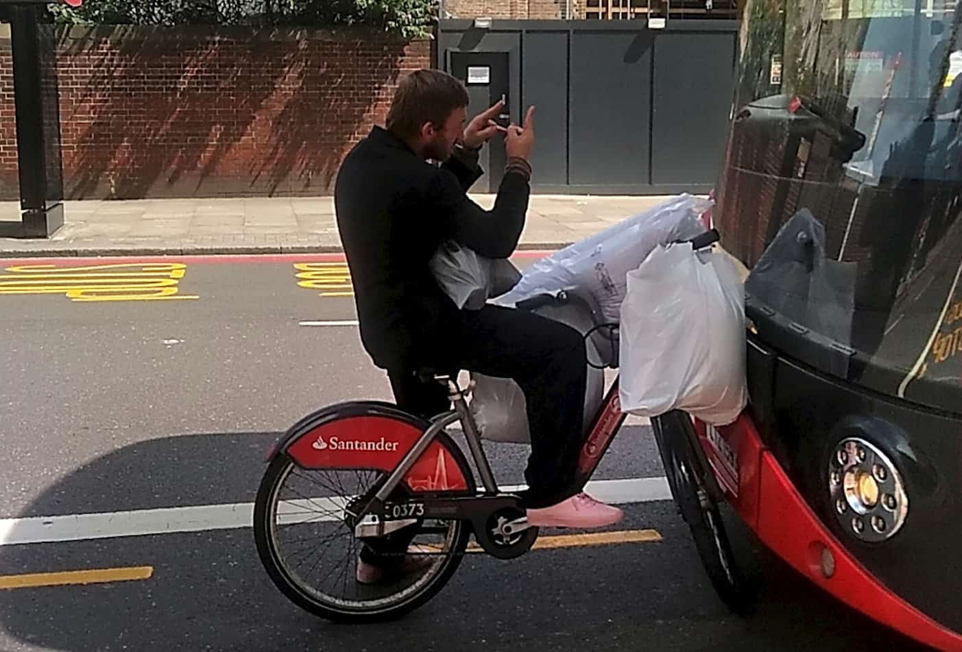 Watch: Angry cyclist tries to take on double decker bus – armed with a Boris Bike