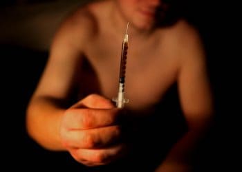 Paul, a heroin addict, before injecting heroin in the town of Portlaoise, Co Laois, where outreach workers believe up to 600 users could be taking heroin behind closed doors.