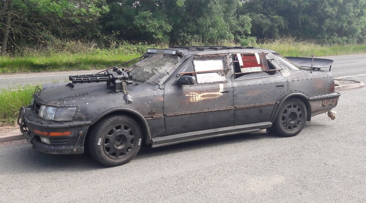 Armed cops dashed to car with MACHINE GUNS mounted on bonnet only to find it was a prop
