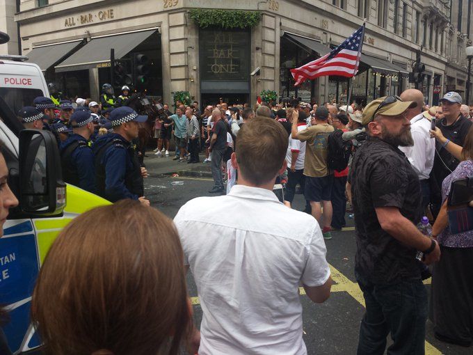 Robinson supporters stand off with police outside All Bar One (c) Chris Hobbs