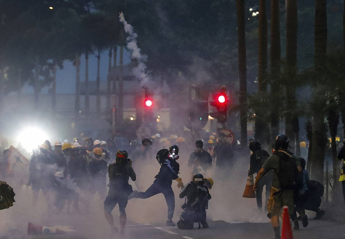 Hong Kong protest escalates as tear gas fired