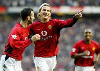 Manchester United's Diego Forlan celebrates with team-mate Ryan Giggs (left) after scoring against Portsmouth during the Barclaycard Premiership match at Old Trafford,   THIS PICTURE CAN ONLY BE USED WITHIN THE CONTEXT OF AN EDITORIAL FEATURE. NO WEBSITE/INTERNET USE UNLESS SITE IS REGISTERED WITH FOOTBALL ASSOCIATION PREMIER LEAGUE.