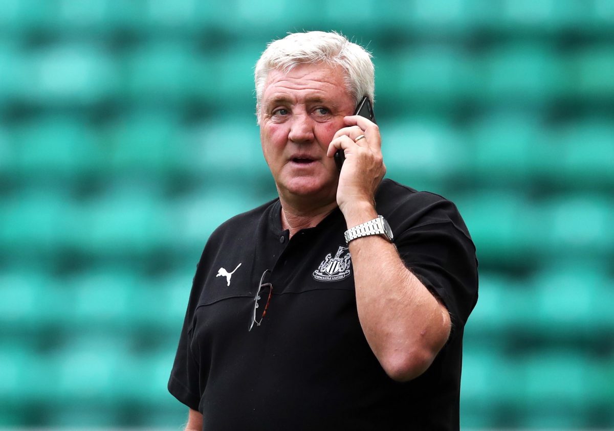 Newcastle United head coach Steve Bruce speaks on the phone before the pre-season friendly match at Easter Road, Edinburgh.