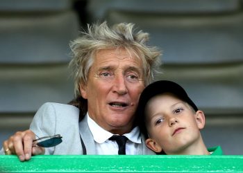 Rod Stewart in the stands with son Aiden during the UEFA Champions League third qualifying round second leg match at Celtic Park, Glasgow.