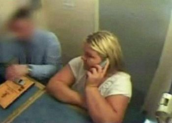 CCTv footage of Vanessa George on the phone to her lawyer while in police custody in Plymouth.
