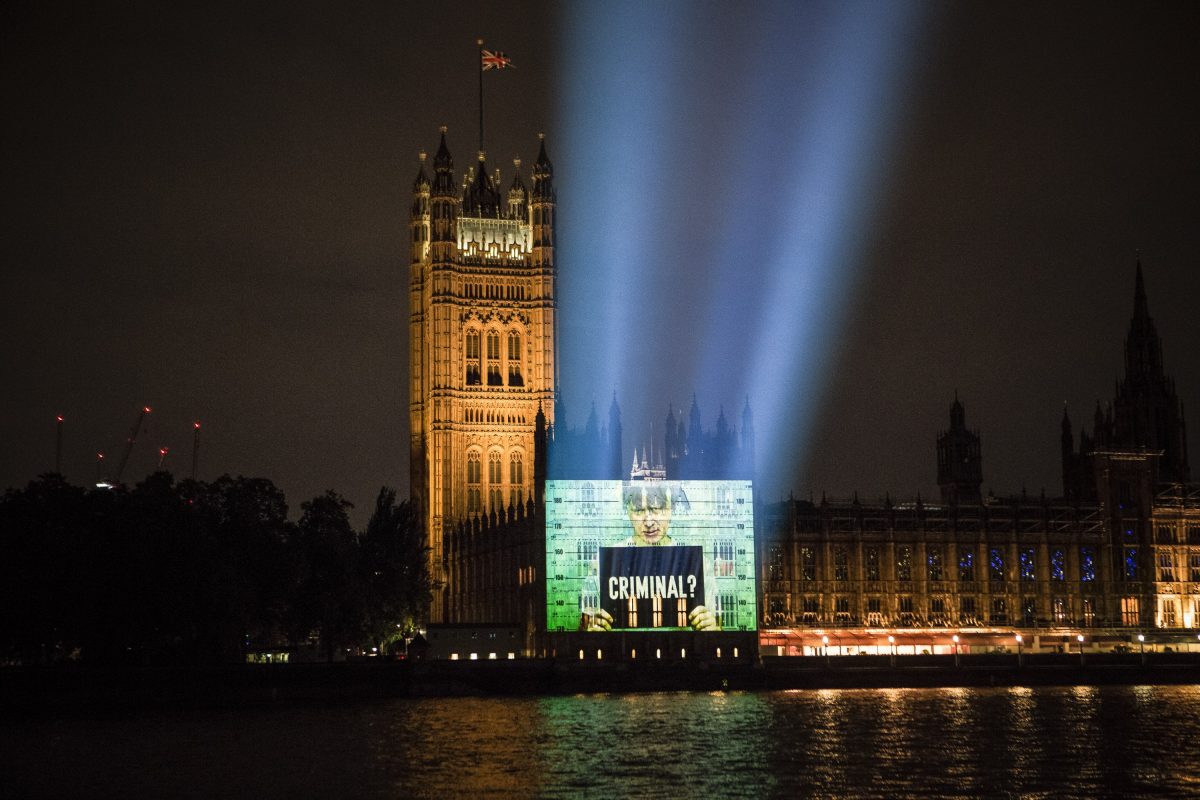 Boris Johnson depicted as criminal in giant Parliament projection