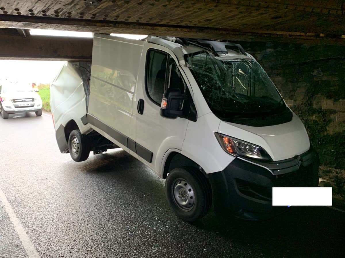 Van completely splits in half after getting stuck under one of Britain’s most bashed bridges