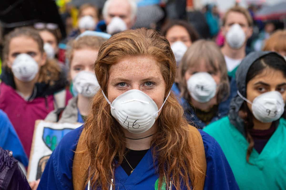 Doctors join climate change protest to warn of health dangers
