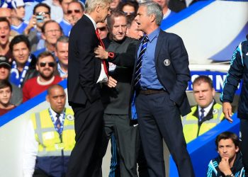 Chelsea manager Jose Mourinho (right) has a heated exchange with Arsenal manager Arsene Wenger (left) on the touchline during the Barclays Premier League match at Stamford Bridge, London. Credit;PA