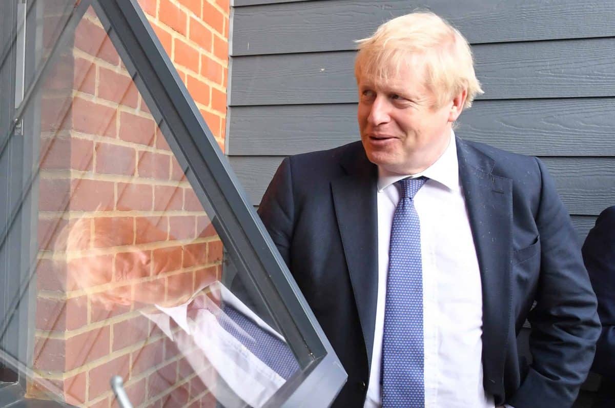Prime Minister Boris Johnson (right) speaks to Paul O'Rourke, who served with the Royal Irish Rangers, during a visit to a veterans centre in Salisbury, whilst on the General Election campaign trail.