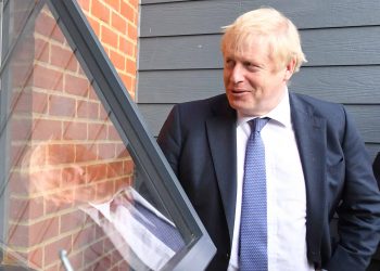 Prime Minister Boris Johnson (right) speaks to Paul O'Rourke, who served with the Royal Irish Rangers, during a visit to a veterans centre in Salisbury, whilst on the General Election campaign trail.