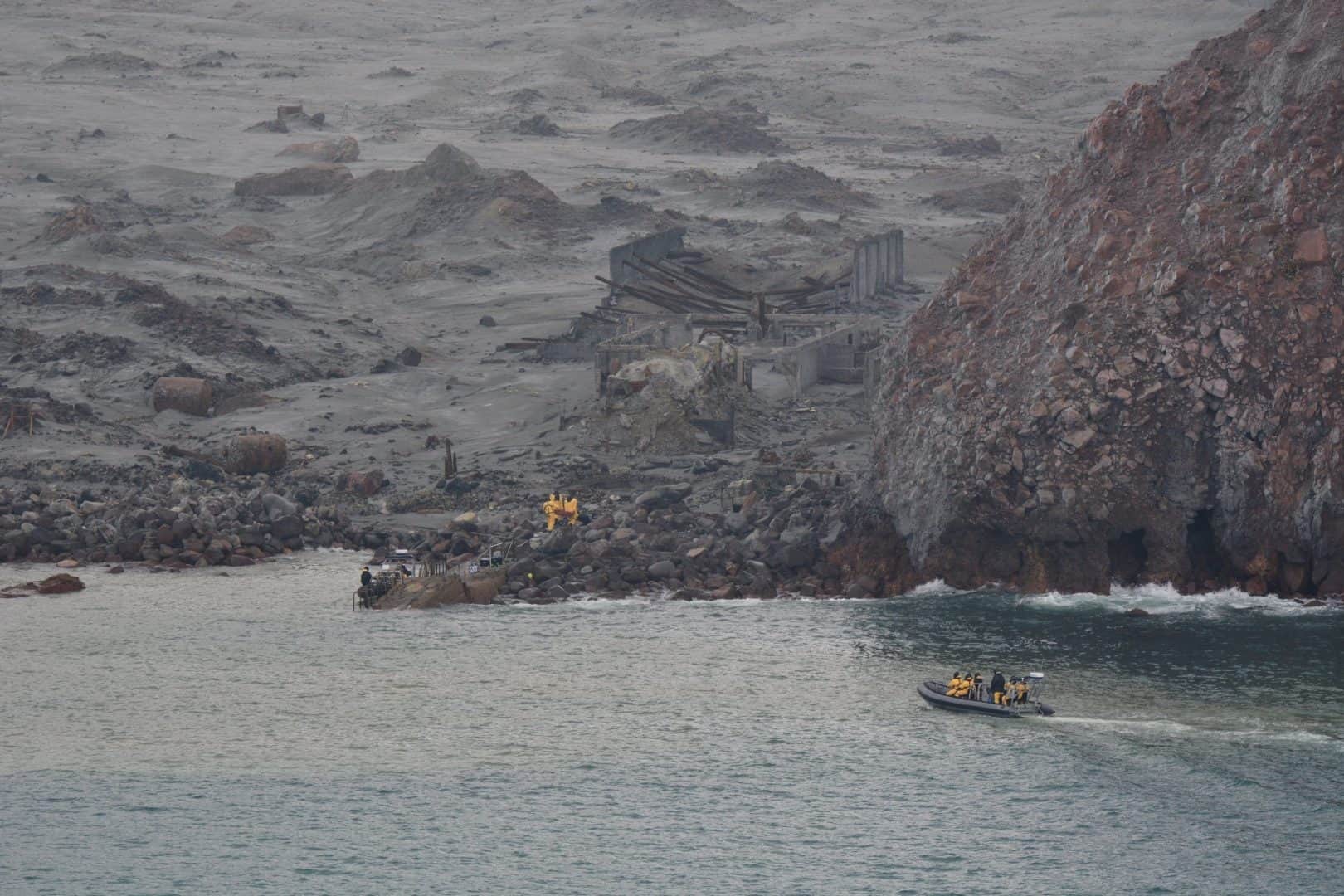 Divers in near zero visibility search for victims of New Zealand volcano