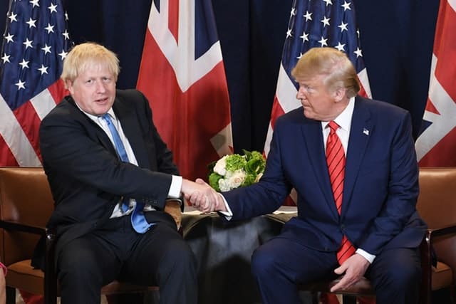 Boris Johnson and Donald Trump (PA)