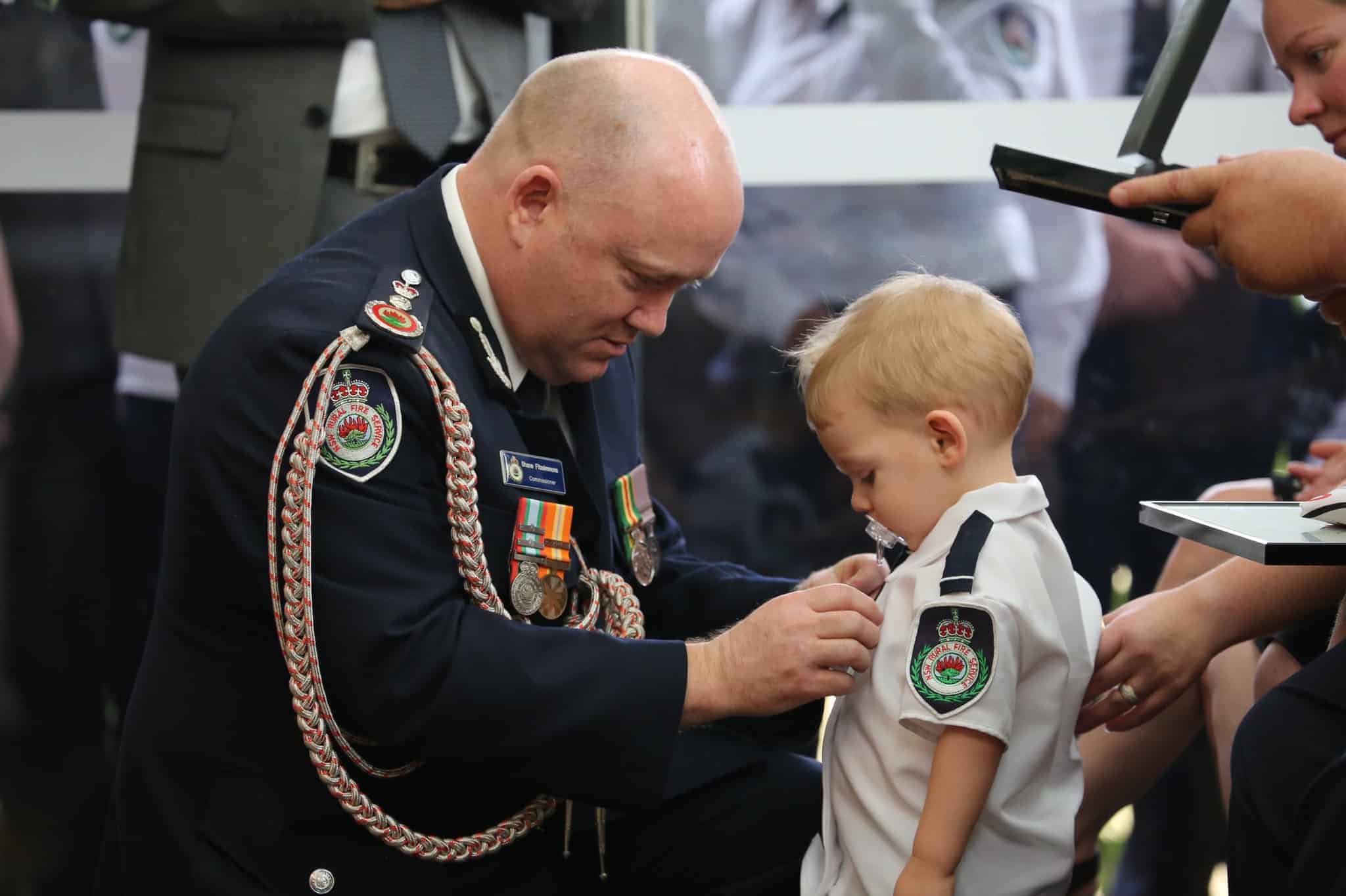 Bravery award for dead firefighter presented to infant son