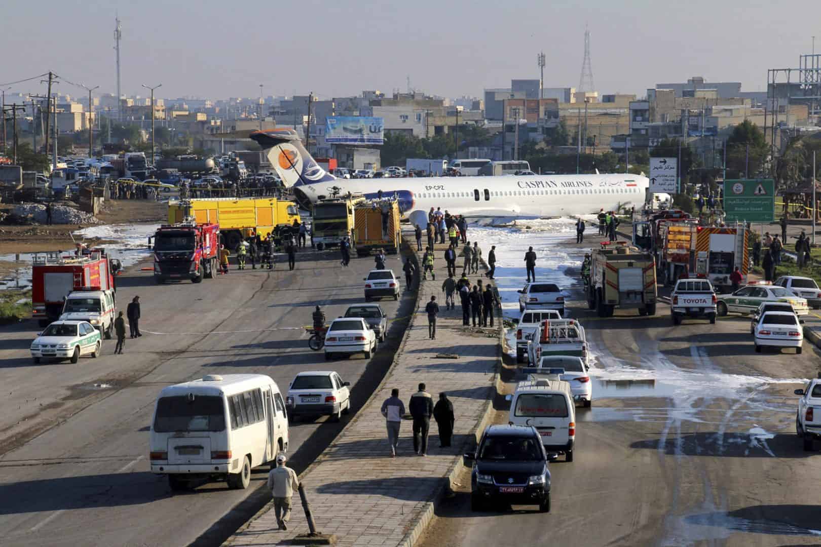Plane skids off runway and into street in Iran