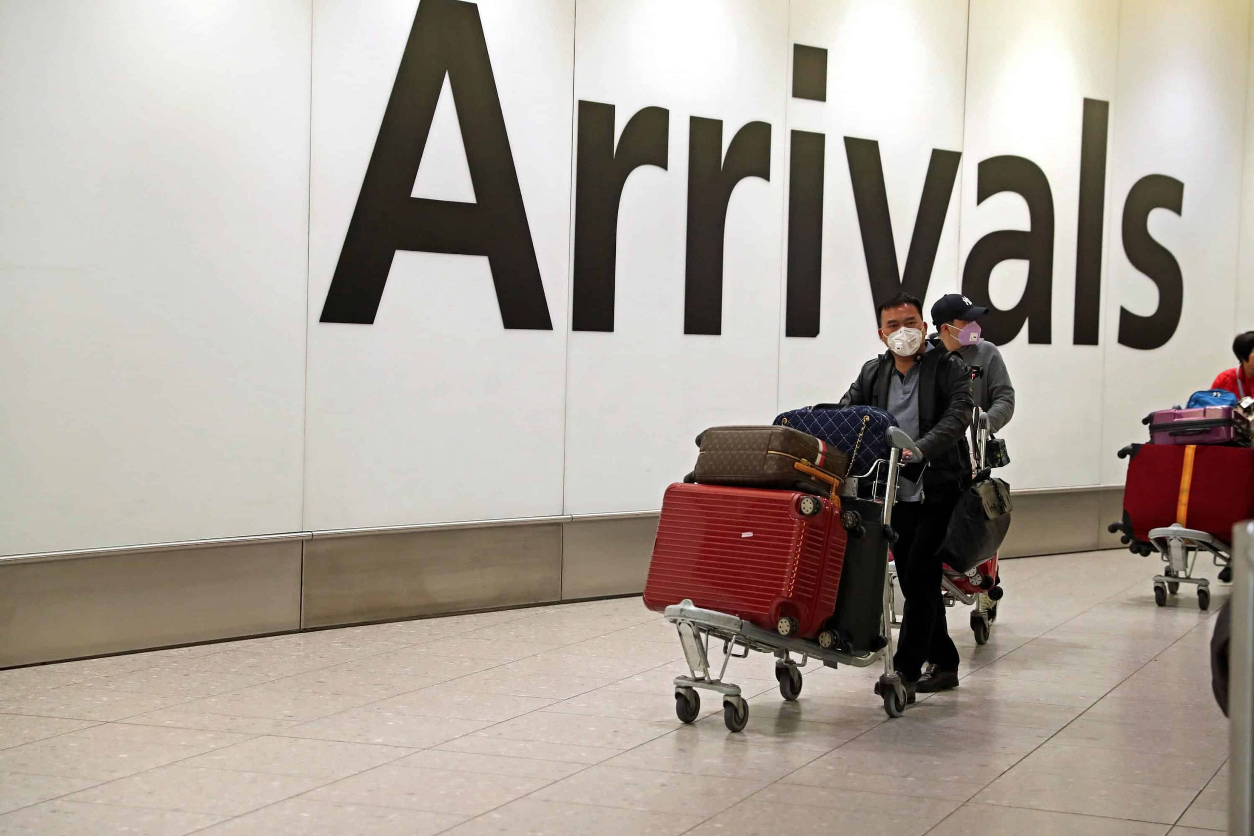 UK hunt for 2,000 Wuhan passengers intensifies over coronavirus concerns