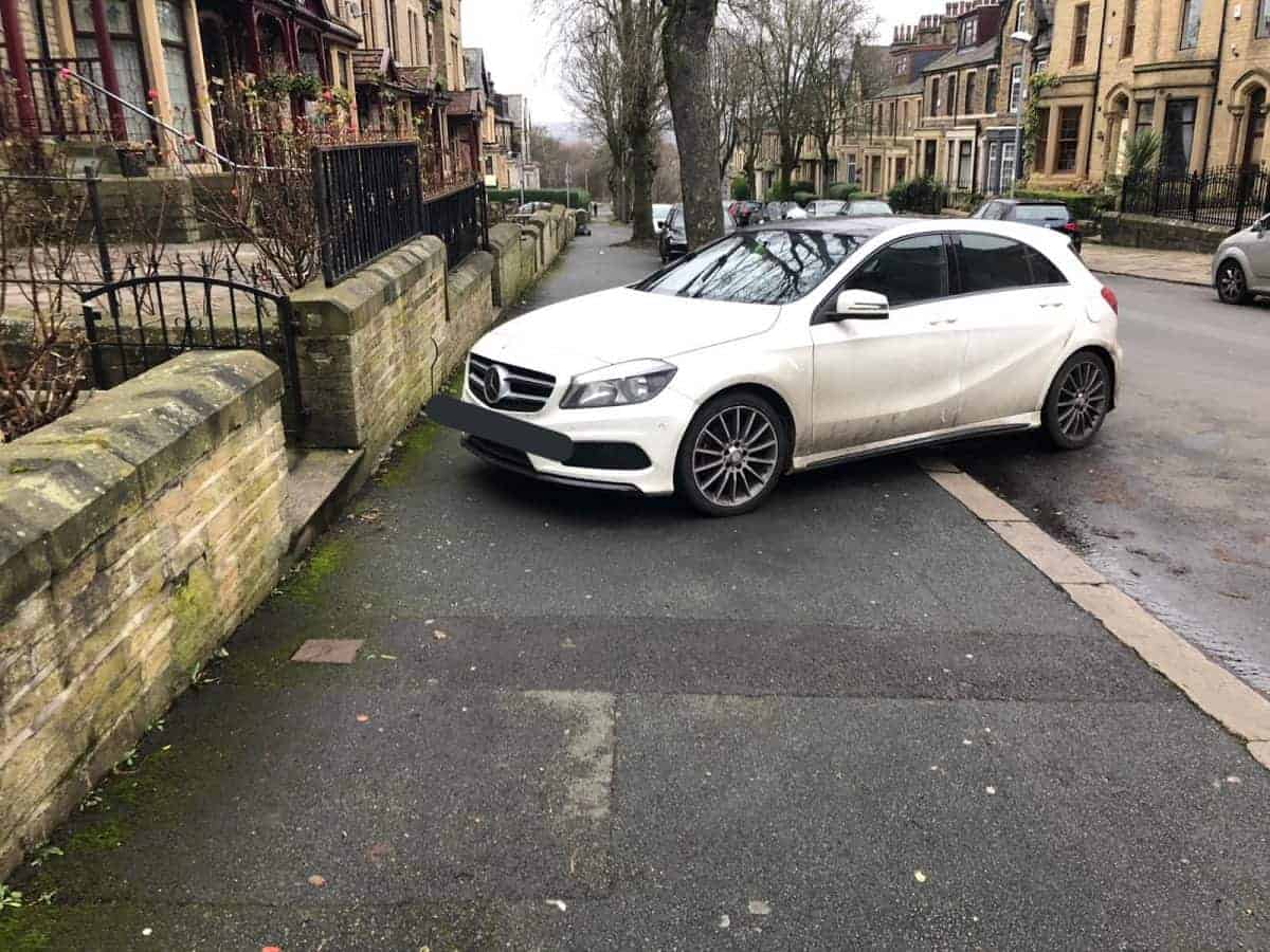Motorist who cops thought had abandoned car on pavement – but had actually PARKED it to visit family