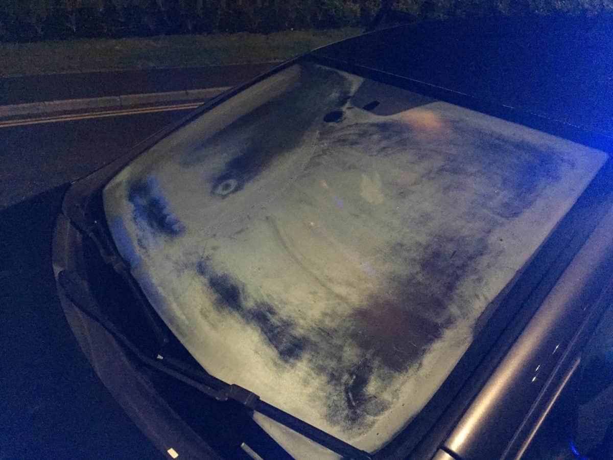 Police pulled over “blindfolded” motorist who drove with frost almost entirely covering their windscreen