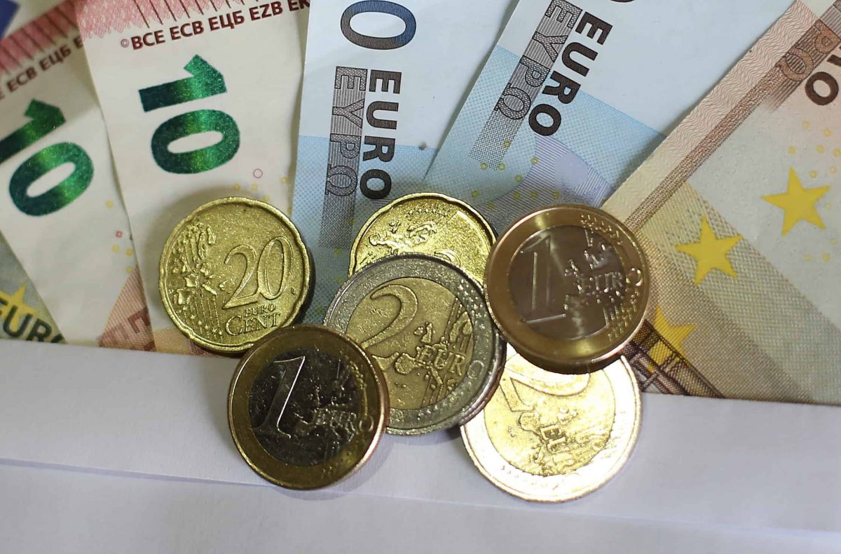 Stock picture of euro notes and coins.