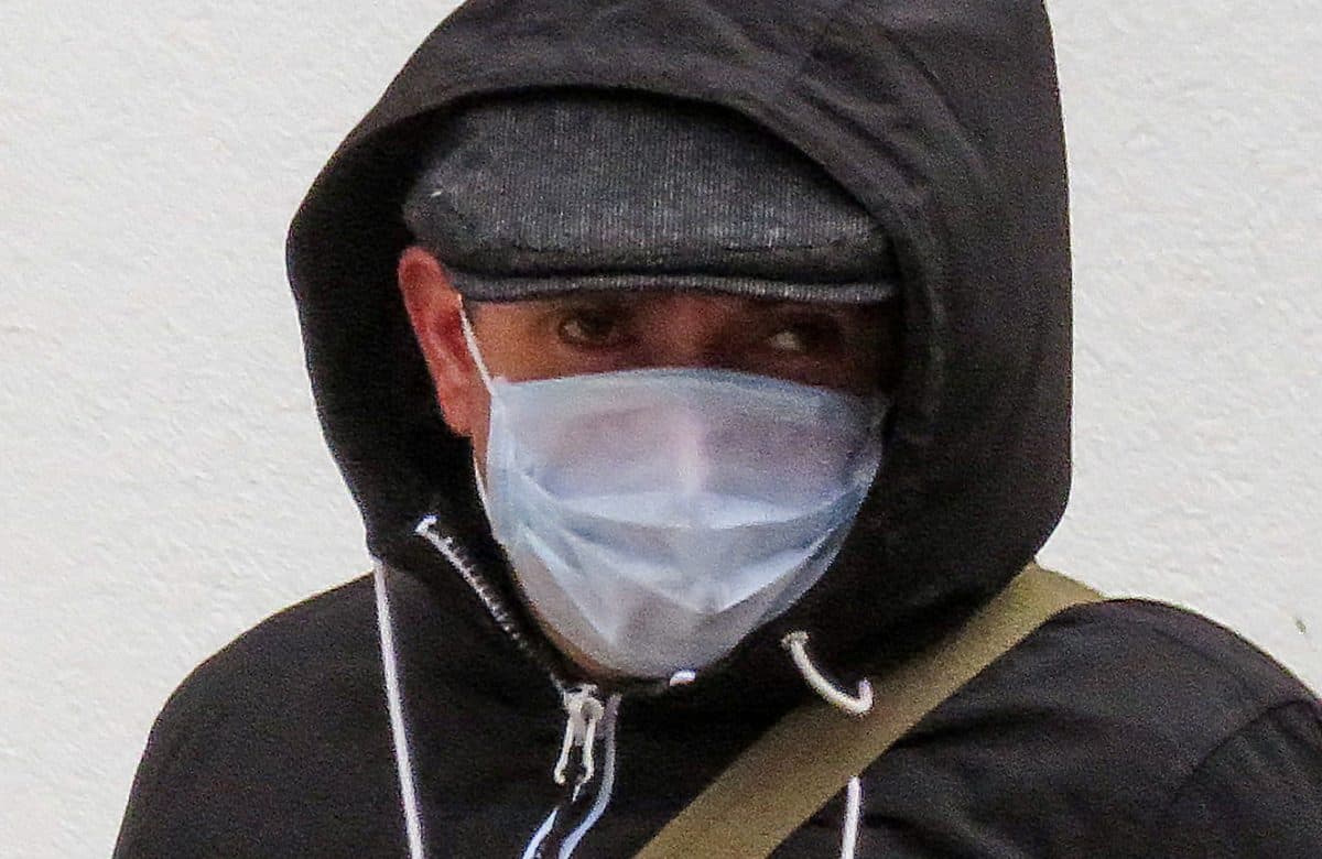 Paedophile dons medical face mask in bid to avoid being photographed after being spared jail