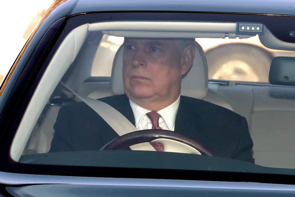 The Duke of York drives his Bentley into Buckingham Palace, London as he arrives for the Queen's Christmas lunch.