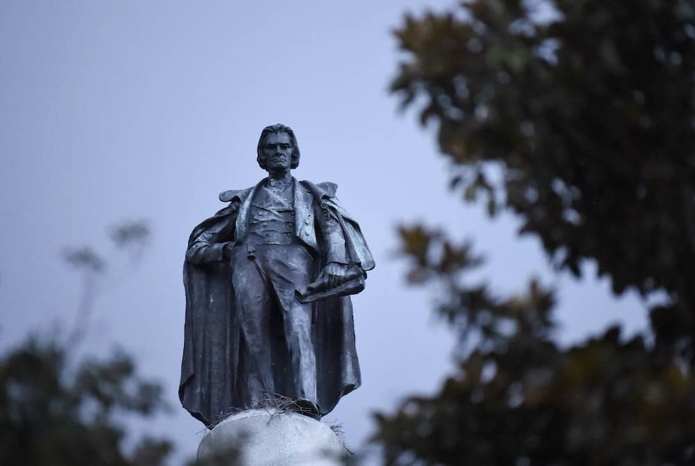 ‘On ash heap of history’ – Crowds watch slavery advocate’s statue removal