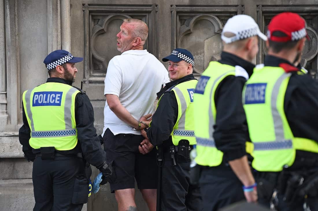 Over 100 arrested as far-right protests condemned as ‘racist thuggery’