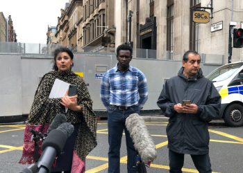 (left to right) Robina Qureshi from the charity Positive Action In Housing, Andrew (no last name given) an asylum seeker and Mohammad Asif speaking to the media in Glasgow about the asylum seeker "accommodation crisis" in Glasgow after an attack in the city last week.Credit;PA