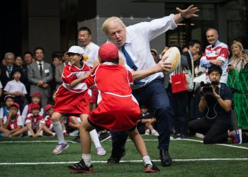 Mayor of London Boris Johnson joins a Street Rugby tournament in a Tokyo street with school children and adults from Nihonbashi, Yaesu & Kyobashi Community Associations, to mark Japan hosting 2019 Rugby World Cup where Mr Johnson is on the final day of his four day trade visit to Japan.Credit;PA
