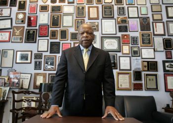 FILE - In this Thursday, May 10, 2007 file photo, U.S. Rep. John Lewis, R-Ga., in his office on Capitol Hill, in Washington. Lewis, who carried the struggle against racial discrimination from Southern battlegrounds of the 1960s to the halls of Congress, died Friday, July 17, 2020. (AP Photo/Susan Walsh, File)