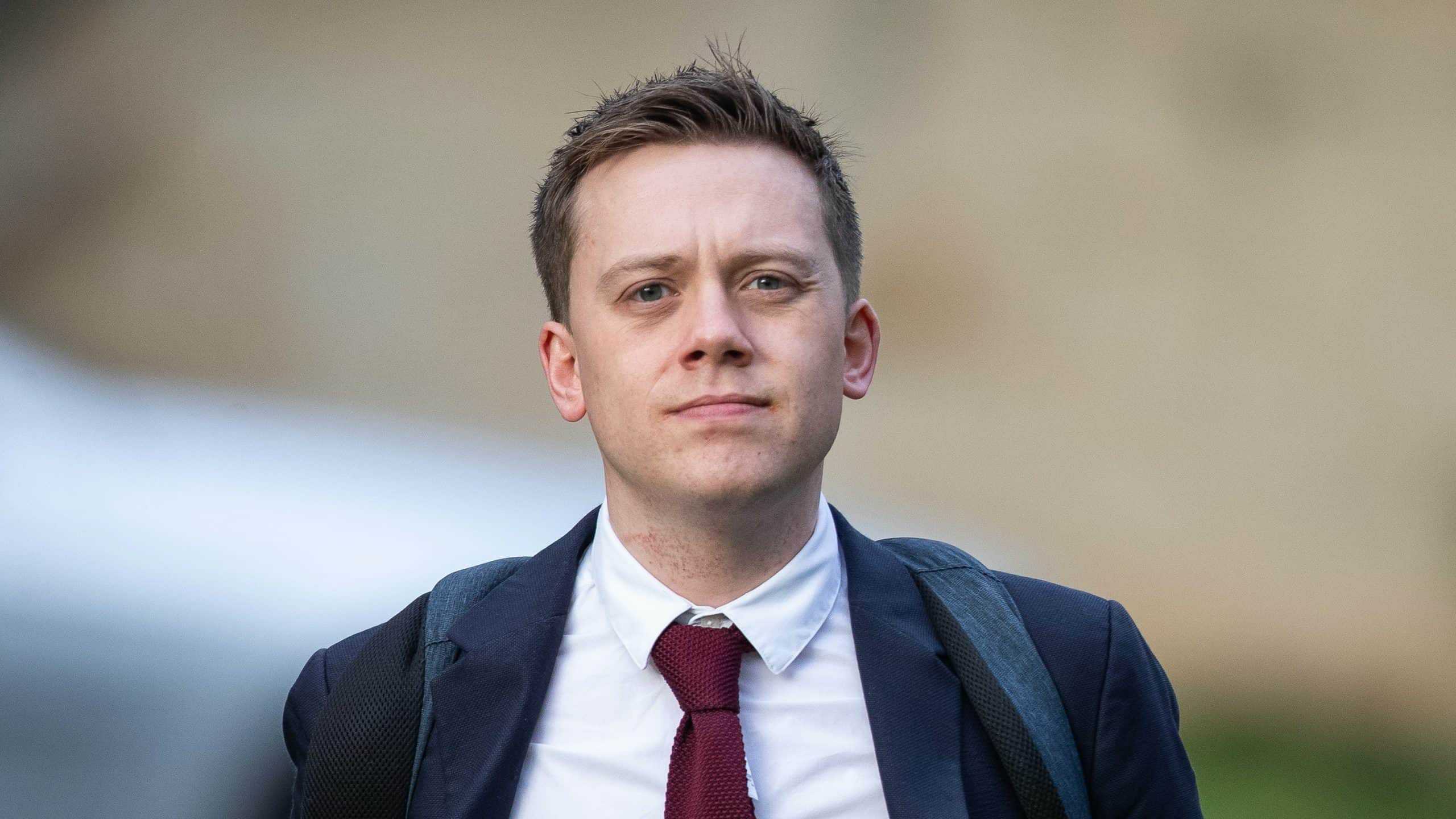 Football hooligan jailed over attack on Guardian columnist Owen Jones