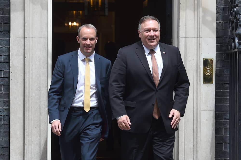 Foreign Secretary Dominic Raab (left) and United States Secretary of State, Mike Pompeo, leaving 10 Downing Street, London, following a private meeting with Prime Minister Boris Johnson. PA Photo. Picture date: Tuesday July 21, 2020. During the visit Mr Pompeo was expected to discuss global priorities, including the Covid-19 economic recovery plans, issues related to China and Hong Kong, and the US-UK free trade agreement negotiations. He will leave the UK on July 22 to travel to Denmark. See PA story POLITICS China. Photo credit should read: Kirsty O'Connor/PA Wire