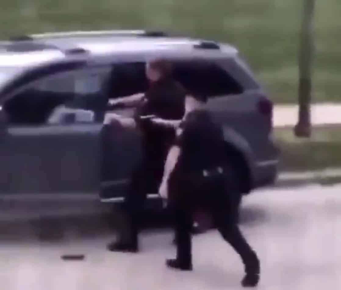 Graphic footage: Unarmed black man shot in the back by Wisconsin police as children look on