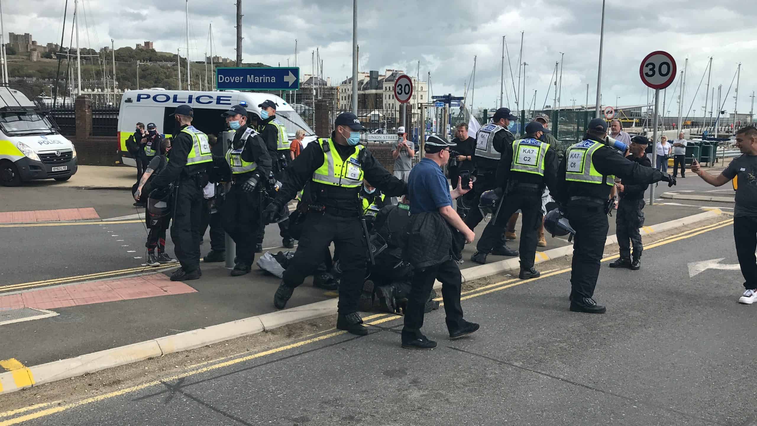 Anti-migrant protesters have clashed with police in Dover