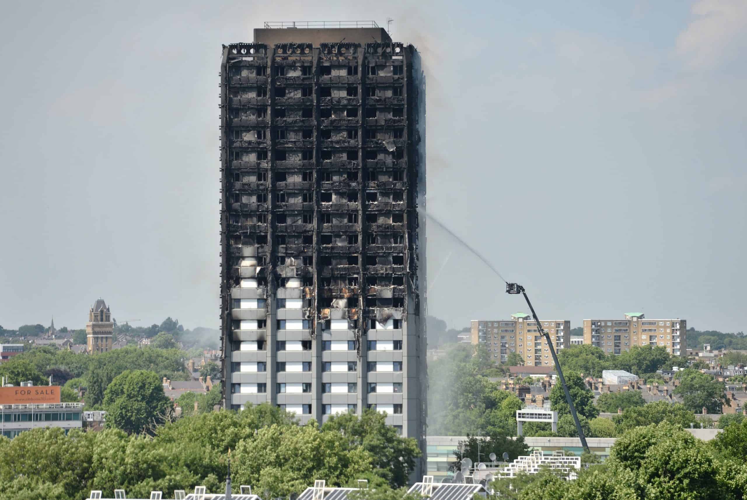 Grenfell cladding firm rigged fire safety tests, ex-employee admits