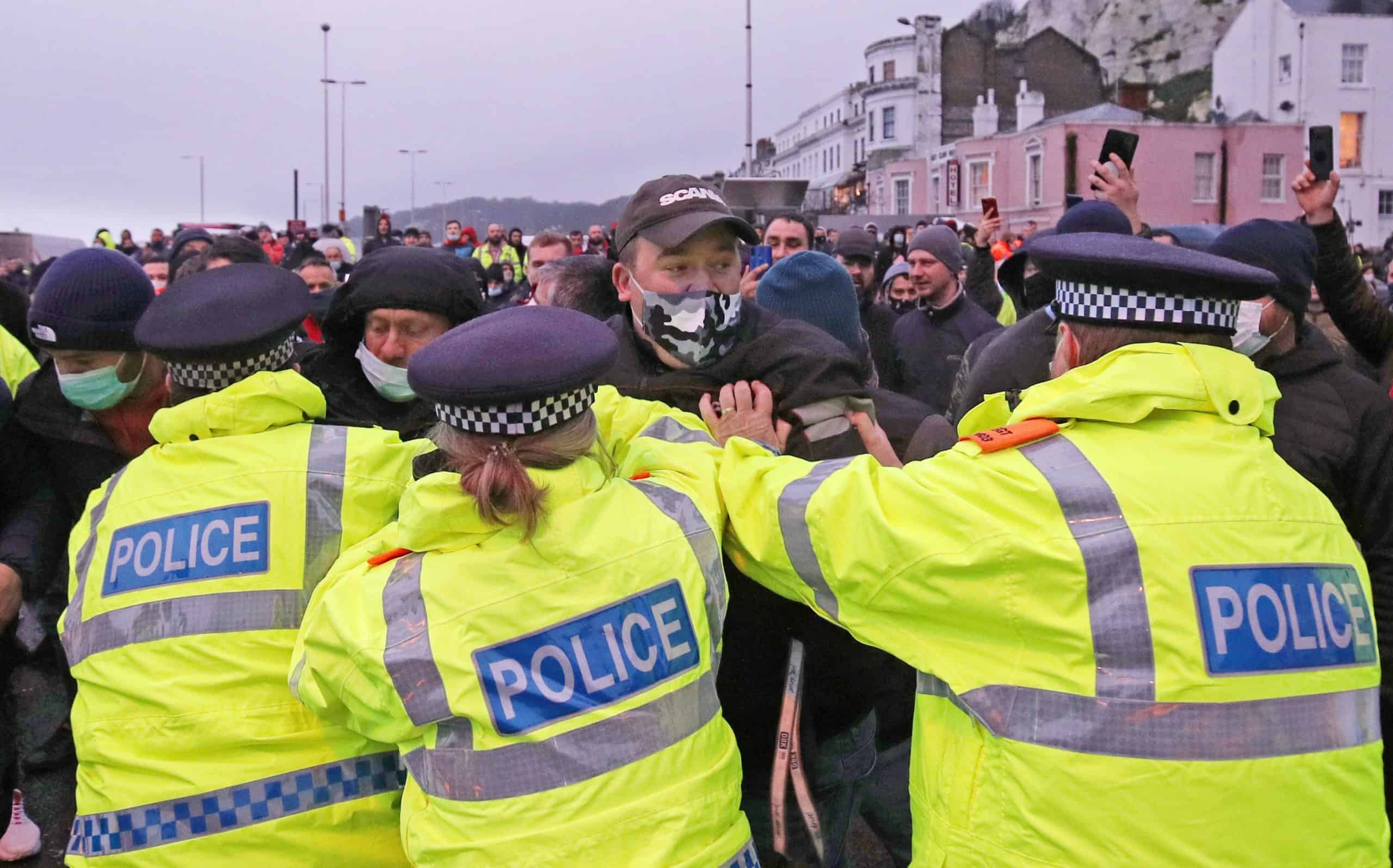 Drivers clash with police in Dover as lorries are further delayed by Covid travel ban