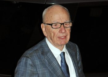 Rupert Murdoch arrives to see the first copies of the new Sun on Sunday newspaper roll off the presses at the News Printers, in Broxbourne Hertfordshire.