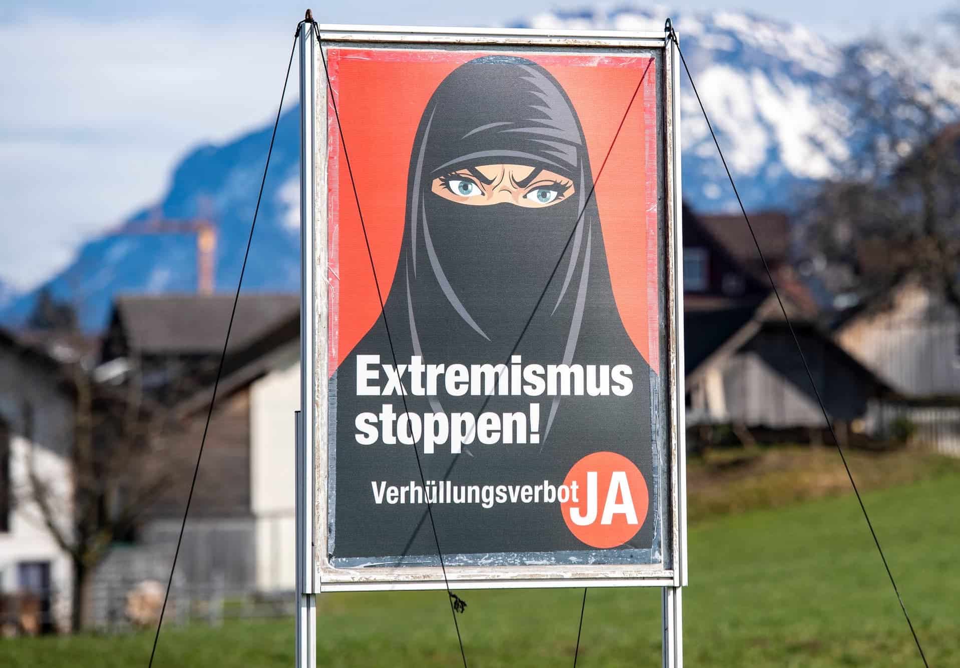 Switzerland votes to ban wearing of Burka