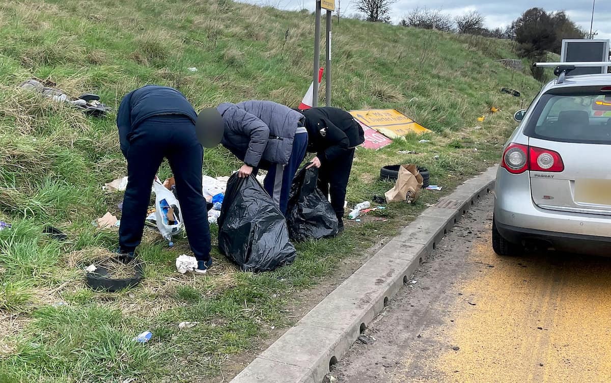‘Instant karma’ Flytippers shamed by police and forced to pick it up after throwing rubbish on motorway