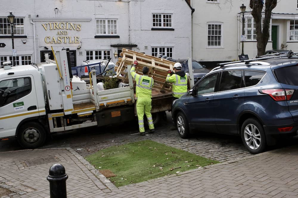 Council killjoys who removed flowerbeds volunteers installed in a car park respond in the best way