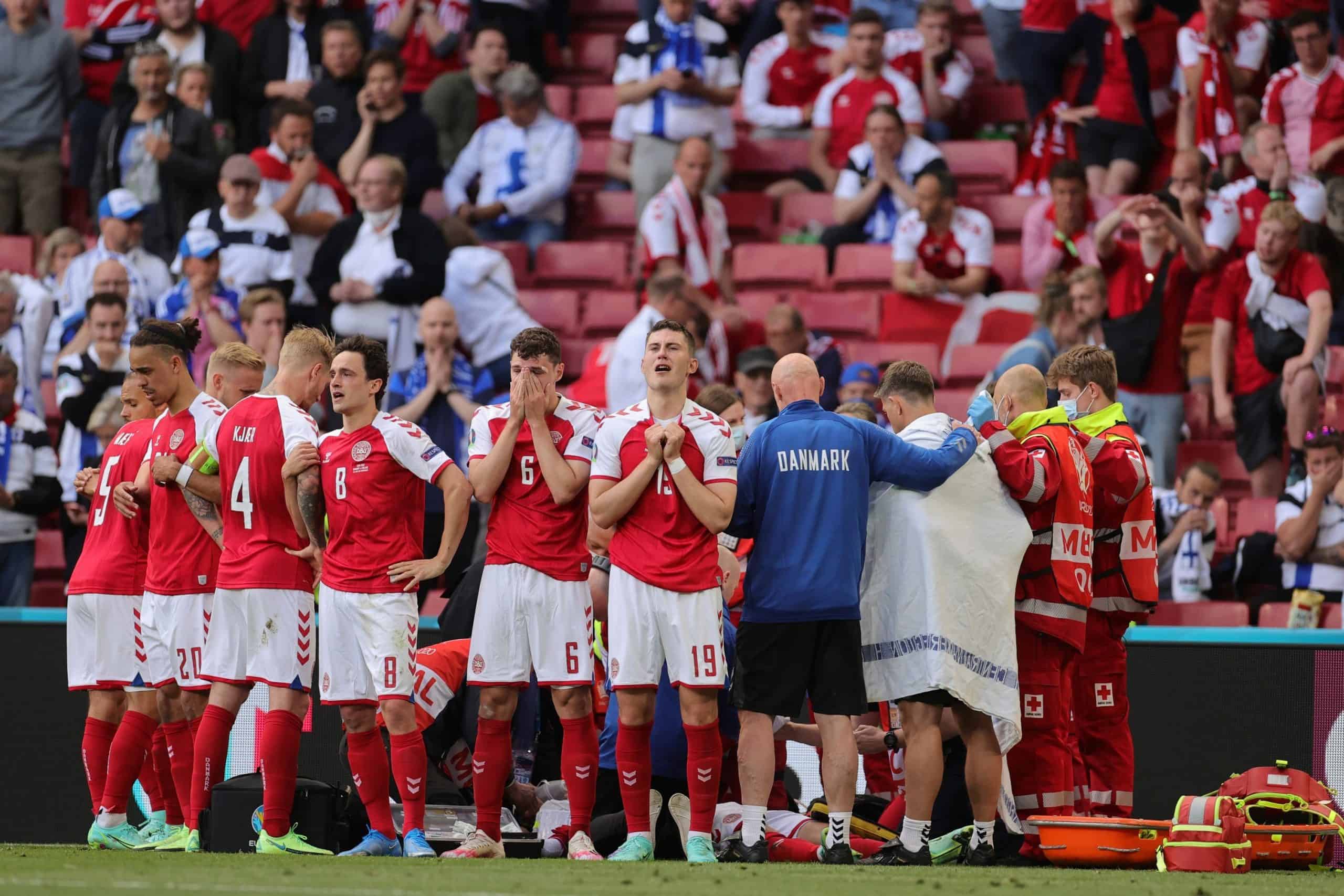 Outpouring of support for Danish players who formed a protective ring around collapsed Eriksen