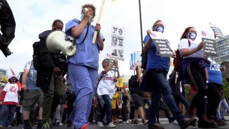Health workers march to Downing Street, London. Credit;PA
