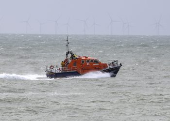 A RNLI lifeboat continues it search for the missing two fishermen that went missing near Seaford, Sussex, after their fishing boat, Joanna C, sank off the coast near Seaford, East Sussex on Saturday.