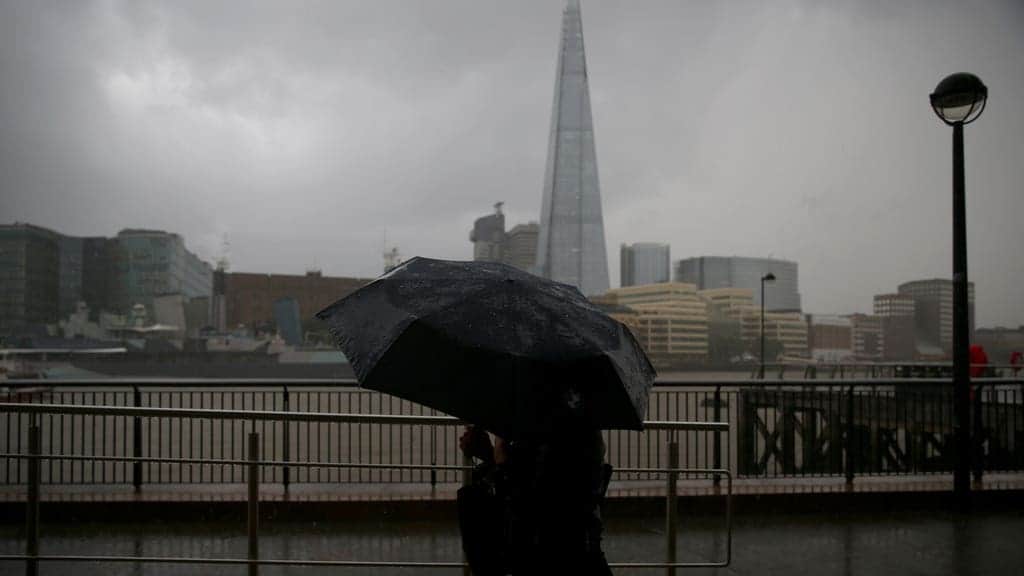 Tower Bridge under water as torrential rain hits London