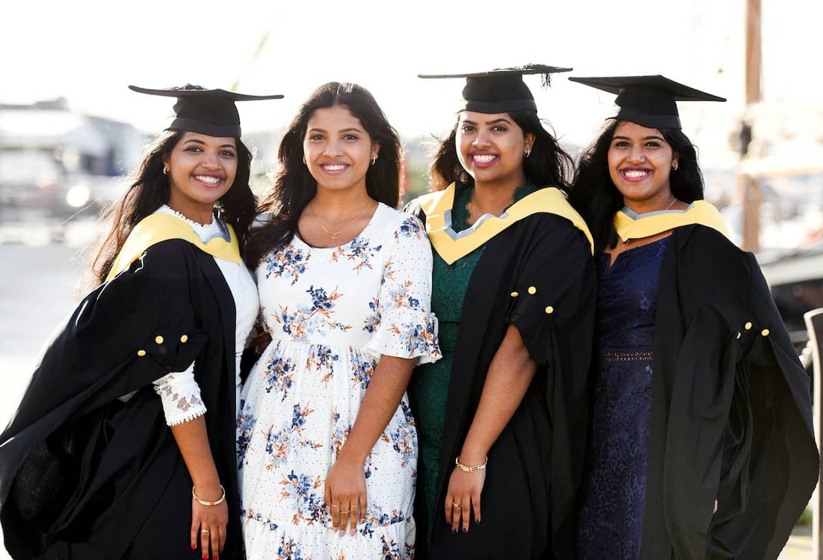 Three of four quadruplets following in mother’s footsteps by working in NHS graduate from uni