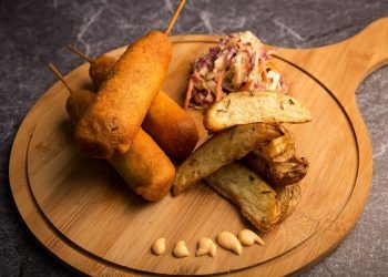 Vegan Corn Dog with Potato Wedges and Crunchy Slaw