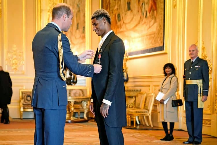 Footballer Marcus Rashford is made an MBE (Member of the Order of the British Empire) by the Duke of Cambridge during an investiture ceremony at Windsor Castle. Picture date: Tuesday November 9, 2021.